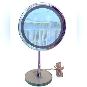 Silver Lighted Magnifying Stand Makeup Mirror on a Clear Lucite Base by HoMedics